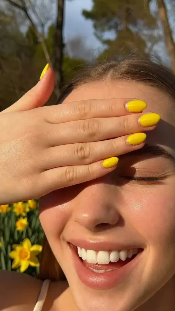 Bright Yellow Glitter Tip Nails